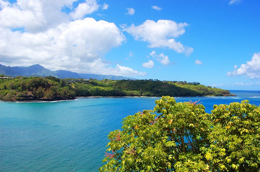 Blue ocean and green Kauai mountains