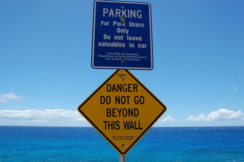 Warning sign at edge of cliff