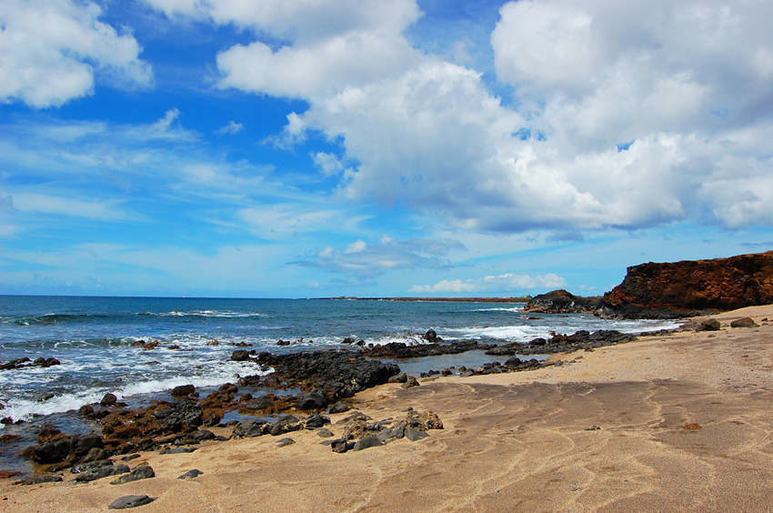 Black Rocks Shining Under the Sun
