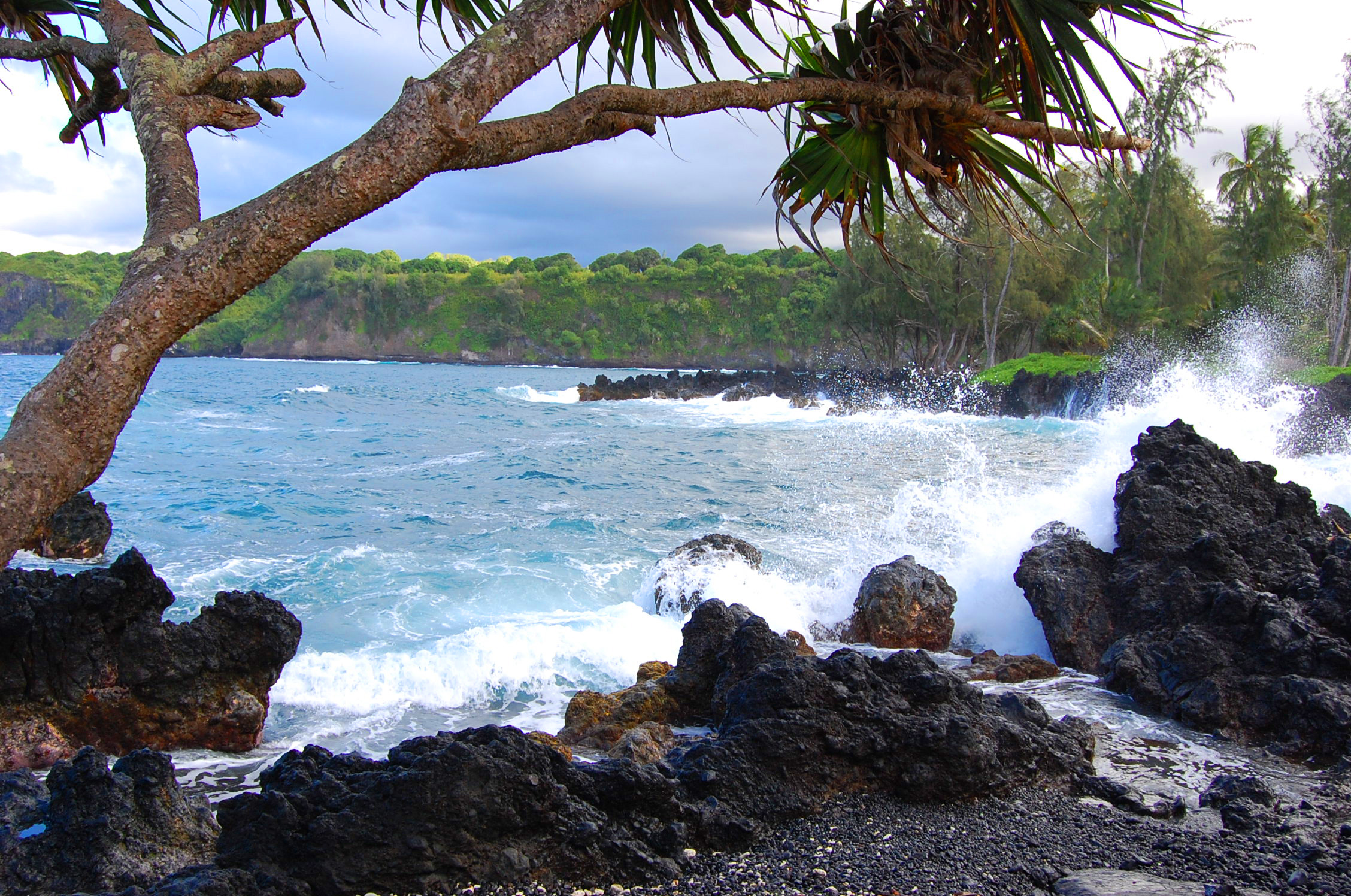 Waves Splash Onto Lava Rocks