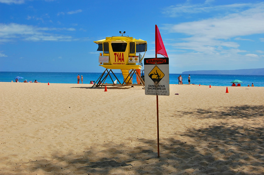 Lifeguard Tower and a Warning Sign
