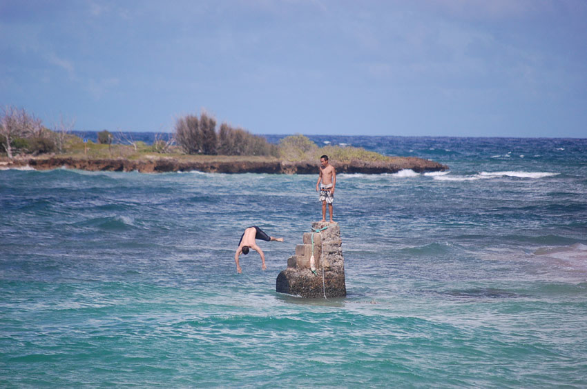 Kids Jump from a Rock